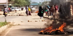 Protesters in Mandera town, Mandera County light fires to protest a ban on the sale of miraa on Sunday, March 22, 2020