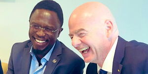 Sports CS Ababu Nmwamba (left) and FIFA President Gianni Infantino (right).