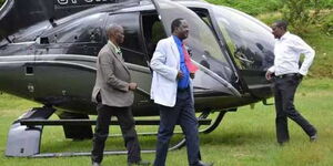 Former Prime Minister Raila Odinga alighting from a chopper in November 2018