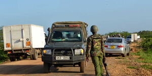 A Police officer observing a traffic flow in Nyogoro area, Lamu County on January 2, 2020.