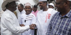 ODM leader Raila Odinga (left) greets leaders of the North Eastern region  during his arrival in Garissa on February 23, 2020, for a BBI rally.