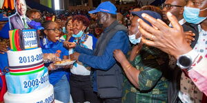 ODM leader Raila Odinga sharing his birthday cake at the Bomas Kenya, Nairobi on Friday January 7, 2022