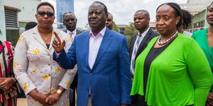 Cabinet Secretary for Gender, Arts, Culture and Heritage Aisha Jumwa with Azimio leader Raila Odinga at Capitol Hill on Tuesday, February 27, 2024. 