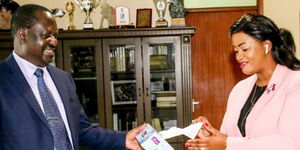 ODM leader Raila Odinga with Laikipia Women Representative Cate Waruguru at Capitol Hill office, Nairobi on Tuesday, June 9, 2020