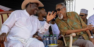 Raila Odinga and BBI taskforce head Yusuf Haji enjoy a hearty moment during the BBI Garissa rally on February 23, 2020.