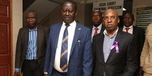 ODM leader Raila Odinga (left) and businessman Jimi Wanjigi leave the court.
