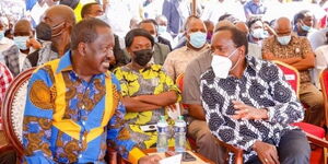 ODM leader Raila Odinga (L) and Wiper leader Kalonzo Musyoka during the burial of Former Kibwezi MP Kalembe Ndile on Friday, June 11.