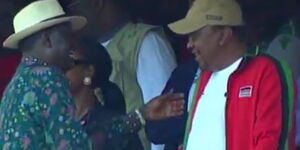 ODM leader Raila Odinga with President Uhuru Kenyatta at the Kasarani Stadium on Sunday, March 8