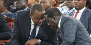 President Uhuru Kenyatta during an event with Raila Odinga