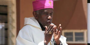 Retired Archbishop Ndingi Mwana a'Nzeki holds prayers at the Limuru Cheshire Home, Kiambu County on September 18, 2009.