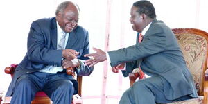 Retired President Mwai Kibaki with ODM leader Raila Odinga