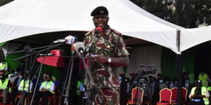 Former Rift Valley Commissioner, George Natembeya and President Uhuru Kenyatta (right)