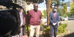 Blogger Robert Alai pictured outside the Milimani Law Courts where he was arraigned on March 23, 2020