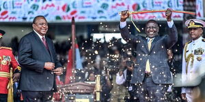 President William Ruto holds ceremonial sword during his inauguration on September 13, 2022.