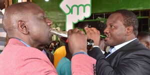 Deputy President William Ruto enjoying a soda at Bumula, Bungoma County on September 27, 2020