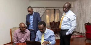 Lawyer Eric Ng'eno (centre) polishes the speech of President William Ruto. He is joined by the president's communications director, Hussein Mohamed.
