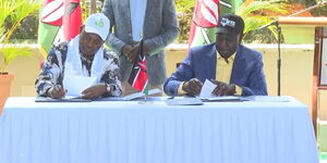 Speaker Justin Muturi and Deputy President William Ruto signing a coalition agreement on Saturday April 9, 2022