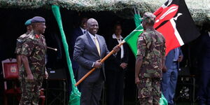 President William Ruto presents the flag to the Kenya Defence Forces (KDF) troops  during deployment to DRC on November 2, 2022.