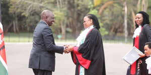 President William Ruto shakes hands with Chief Justice Martha Koome at State House, Nairobi on September 14, 2022.