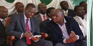 DP William Ruto (left) speaks to Senate Majority Leader Kipchumba Murkomen at a past function.