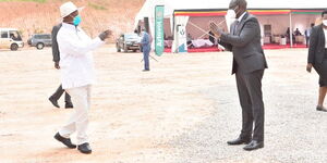 William Ruto and Yoweri Museveni  