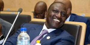 President William Ruto smiling during a commitee meeting of African Head of State and Government on Climate Change in Addis Ababa Ethiopia on Saturday February 18, 2023