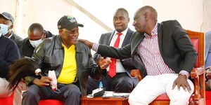 President William Ruto and UDA Chairman Johnson Muthama during a past event