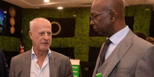 Acting Safaricom CEO Michael Joseph with the former Bob Collymore.