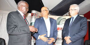 Sameer Africa founder Naushad Merali (Centre), board members Erastus Mwongera(Left) and Sameer Africa Managing Director Allan Walmsley in a past meeting.