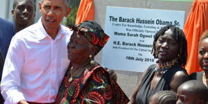 A file image of Barack Obama with his grandmother, Mama Sarah Obama, in K'Ogelo village