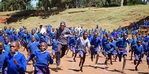 Students of Kamariny Primary School take part in physical activities.