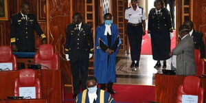 Senate Speaker Ken Lusaka (front) leads senators in a meeting on Tuesday, March 31, 2020