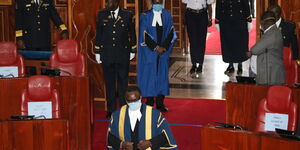 Senate Speaker Ken Lusaka makes his way to the chambers on Tuesday, March 31, 2020 donning protective gear
