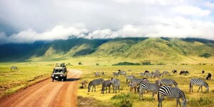 Image of tourists enjoying Safari in Serengeti National Park in Tanzania