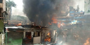 Shops around Shivlin Supermarket in Kisii razed down on Tuesday, February 15, 2022.