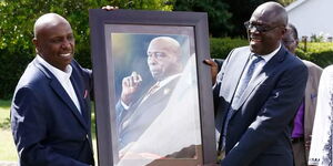 Siaya Governor Cornel Rasanga hands over portrait of former president to Baringo Senator Gideon Moi
