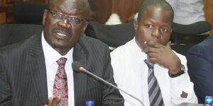 Siaya Governor Cornell Rasanga and his Finance Director Daniel Nyonje respond to audit queries at Parliament on August 6, 2018.