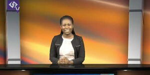 Michael Ashura delivering a past news bulletin on Signs TV