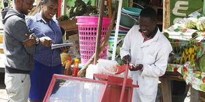 A smokie vendor pictured in Nakuru County in 2018