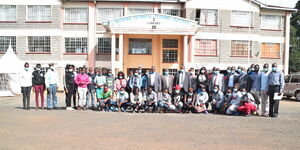 Some of the 300 youth selected for a KeNHA empowerment programme pose for a photo