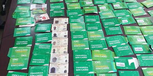 Some of the electronics and sim cards seized during a raid in Juja on Thursday, May 14, 2020.