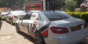 A fleet of luxury cars branded with messages in support of the Building Bridges Initiative and Nairobi Governor Mike Sonko pictured on Wednesday, February 26