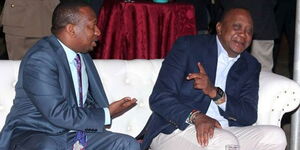 Former Nairobi Governor Mike Sonko (left) with President Uhuru Kenyatta