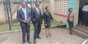 Former Nairobi Governor Evans Kidero (centre) and his lawyer Julie Soweto during the hearing of his petition against the election of Gladys Wanga at the Homa Bay High Court on October 7, 2022.
