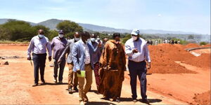 Sports CS Amina Mohammed (front center) and other officials asses Wote Stadium in Makueni County.