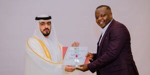 SpotOn CEO Mark Steve (right) receives an award in Dubai on Saturday, July 23, 2022.