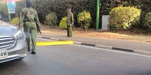 An image of police officers on a roadblock leading to State House, Nairobi.