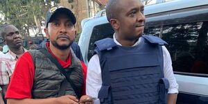 Photo of Dafton Mwitiki and Steve Mbogo pictured outside the Dusit D2 hotel in Nairobi on January 15, 2019