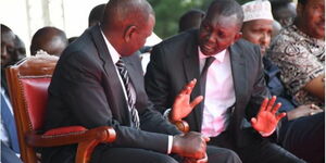 File image of Kapseret MP Oscar Sudi speaking to Deputy President William Ruto