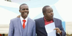 South Mugirango MP Sylvanus Osoro(left) and Interior Cabinet Secretary, Fred Matiangi(Right)